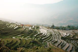 A misty morning over terraced rice fields in Yuanyang, Yunnan.