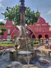 water fountain near tree