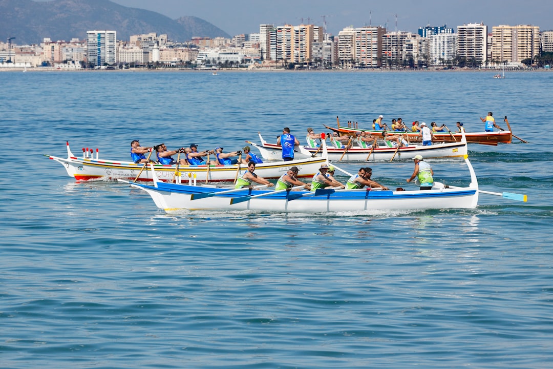 people riding boat during daytime