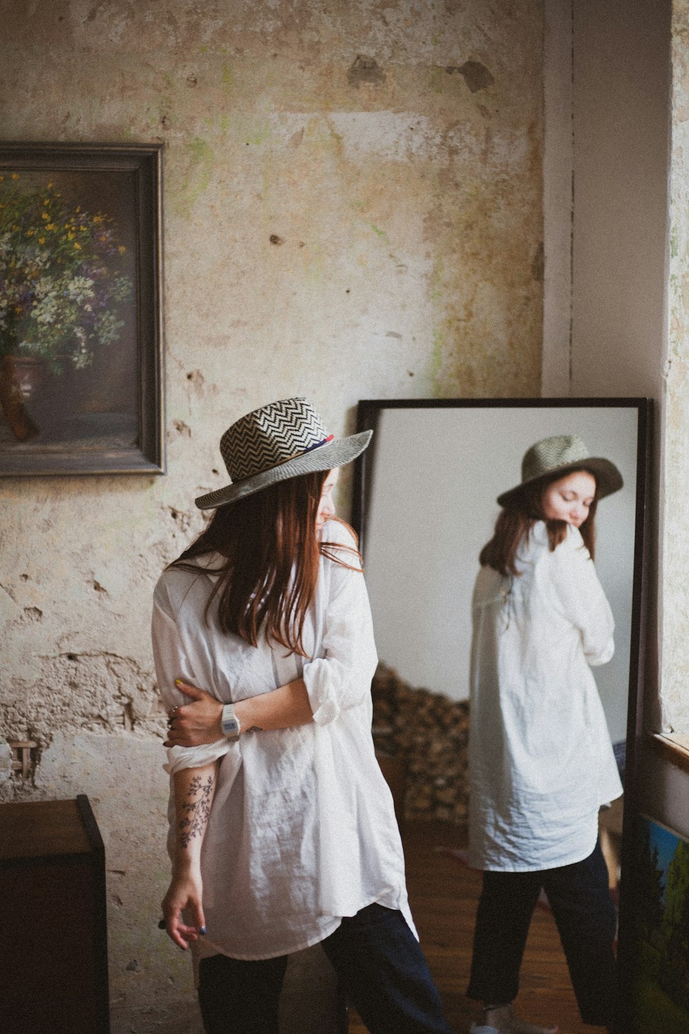 woman standing near mirror