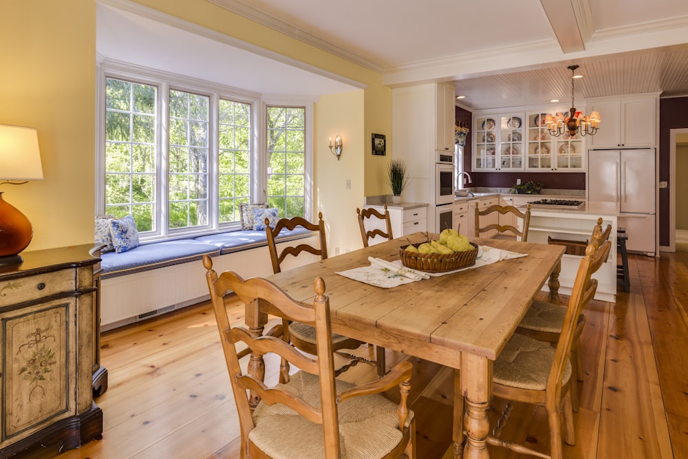 rectangular brown wooden table with chairs set