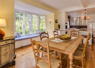 rectangular brown wooden table with chairs set