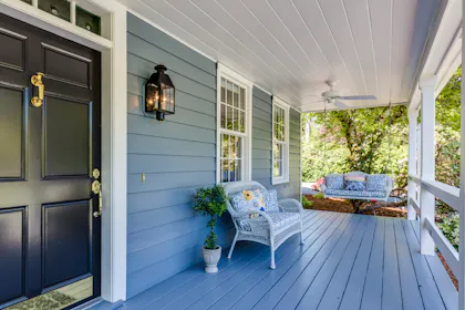 Front porch with two chairs and a view