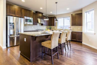 brown kitchen cabinet with kitchen island