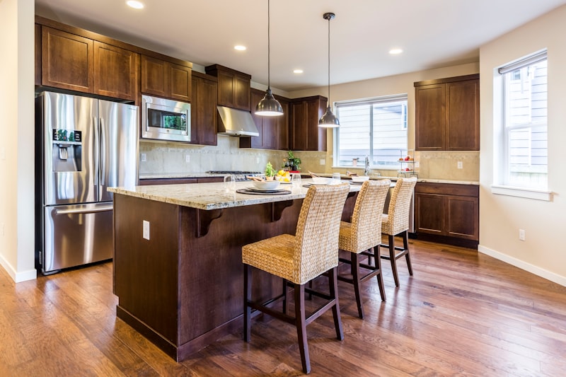 brown kitchen cabinet with kitchen island