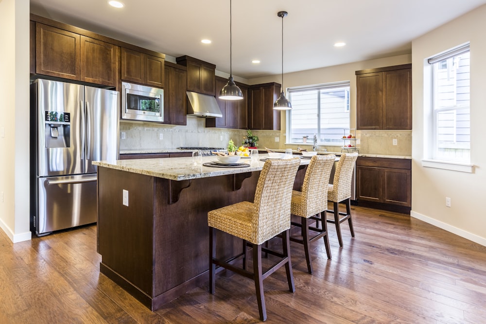 brown kitchen cabinet with kitchen island