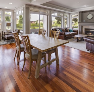 rectangular brown wooden table and chair set