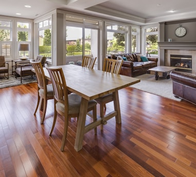 rectangular brown wooden table and chair set