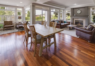 rectangular brown wooden table and chair set