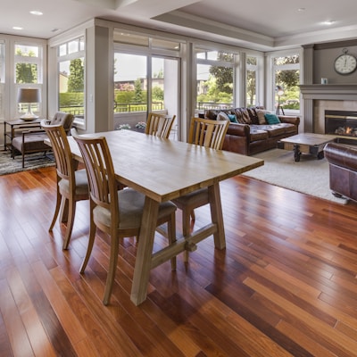 rectangular brown wooden table and chair set