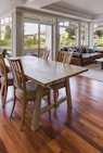 rectangular brown wooden table and chair set