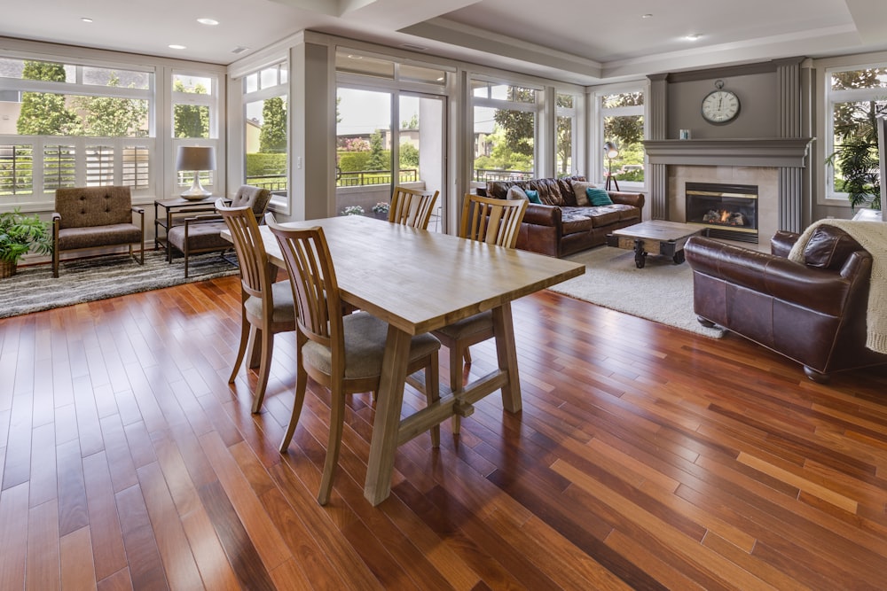 rectangular brown wooden table and chair set