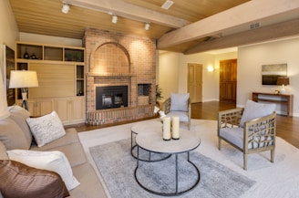 Before and after of a cozy living room remodel with updated finishes.