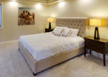 beige bed with white mattress