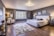 A bright and inviting bedroom featuring elegant decor and a comfortable bed.