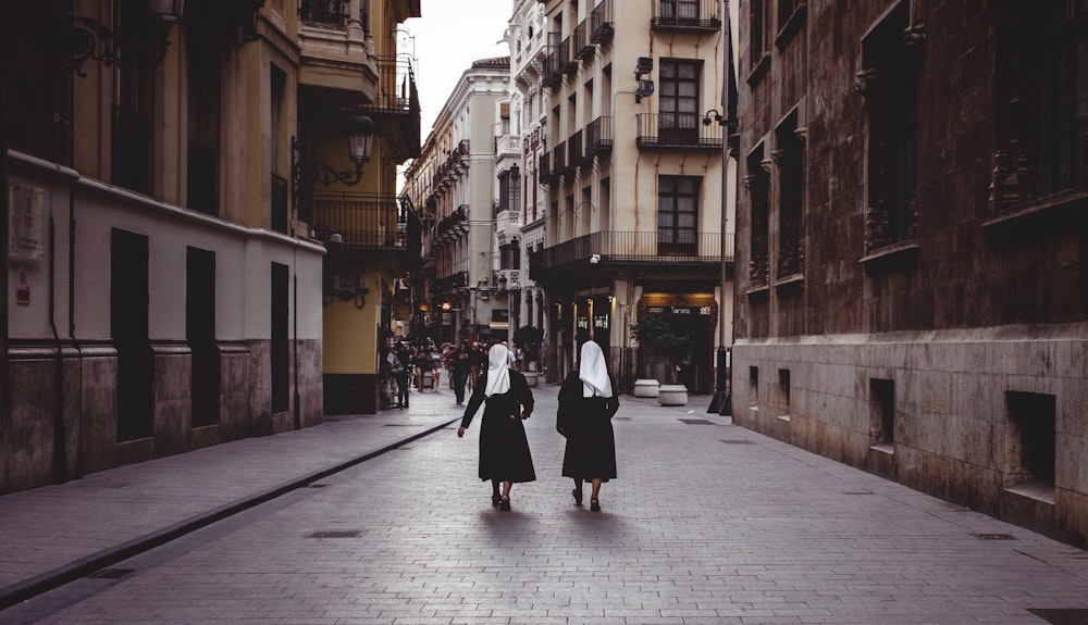 two nun walking side by side