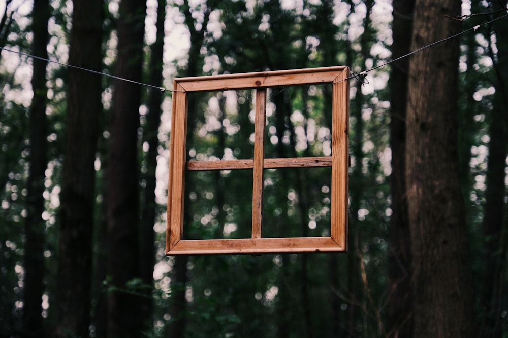 square brown wooden window panel