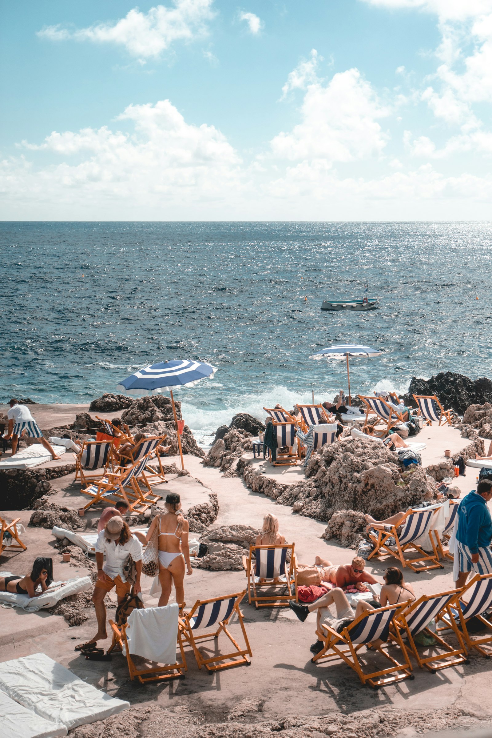 Sony a7R + Sony Vario Tessar T* FE 24-70mm F4 ZA OSS sample photo. People standing near beach photography