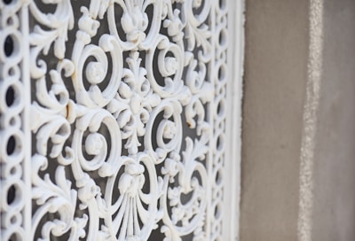 Close-up of decorative wrought iron pergola showcasing craftsmanship