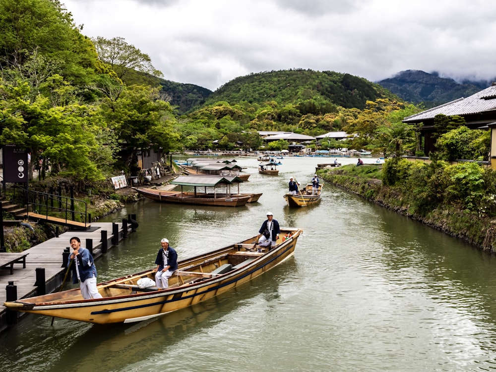 people riding on boat during daytime