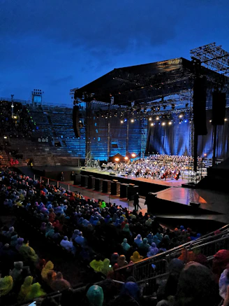 people performing on stage during nighttime