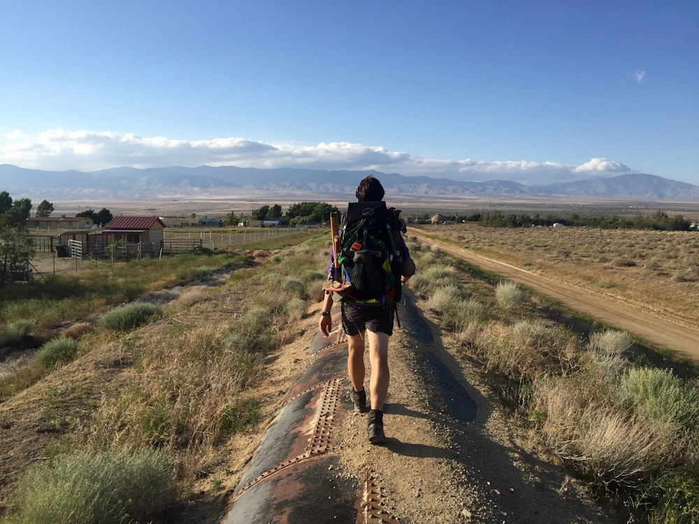 woman walking on pathway