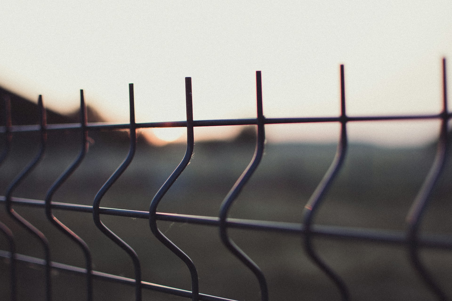 woman wearing yellow long-sleeved dress under white clouds and blue sky during daytime