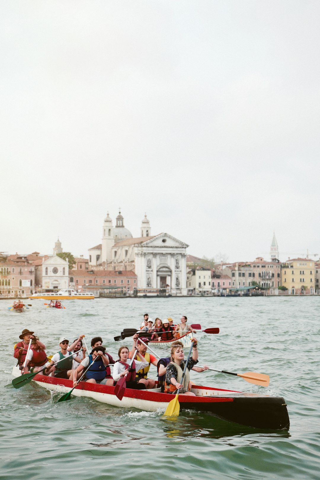 group of person riding on paddle boat