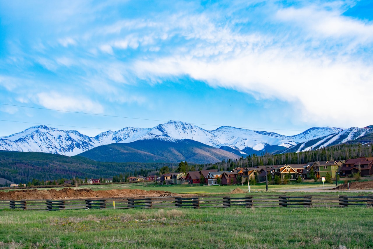 New homes in a Central Oregon neighborhood with Cascade mountain views and blue sky