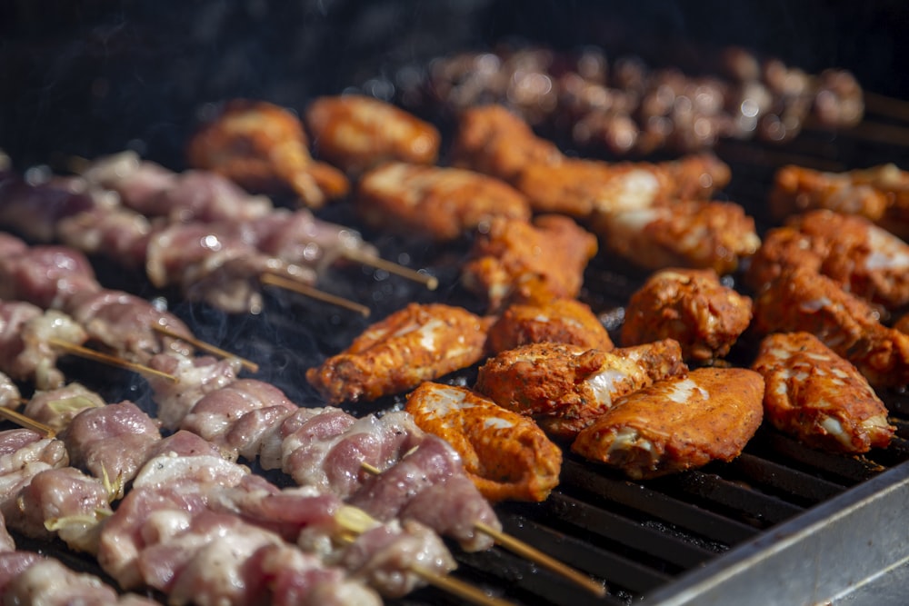 meat on black metal grill