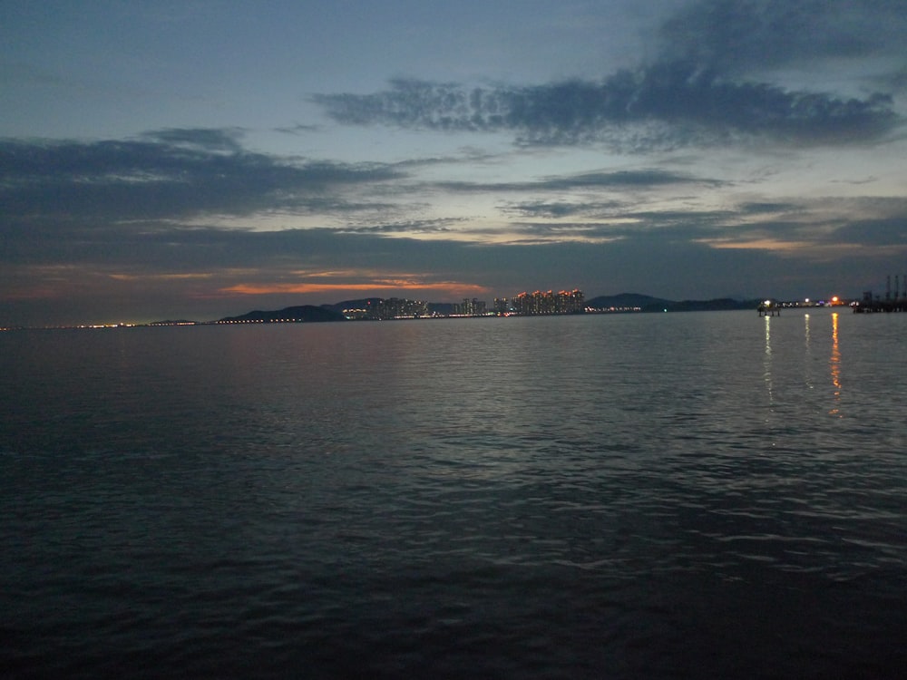 landscape photography of cityscape by the sea during daytime