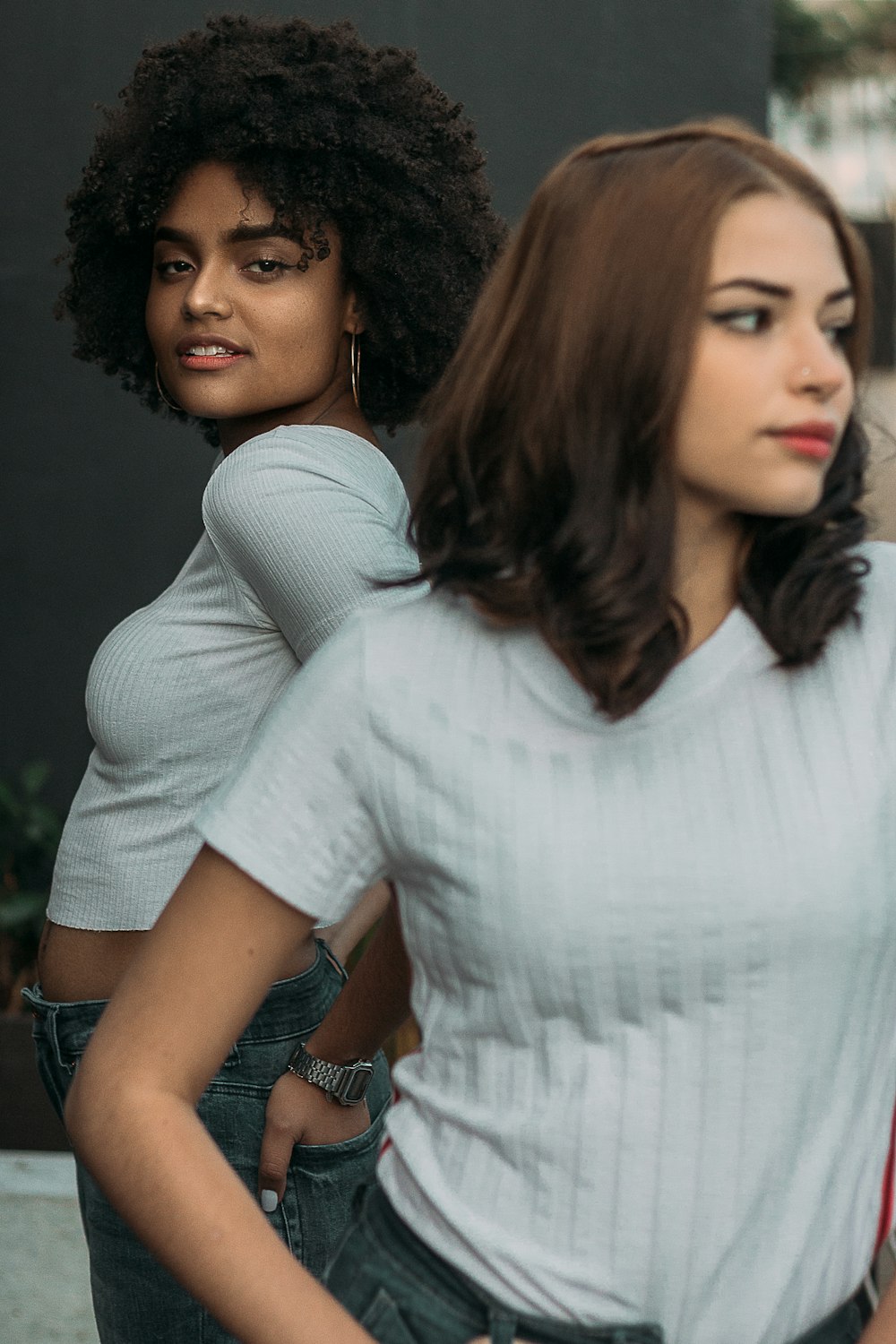 two woman on focus photography