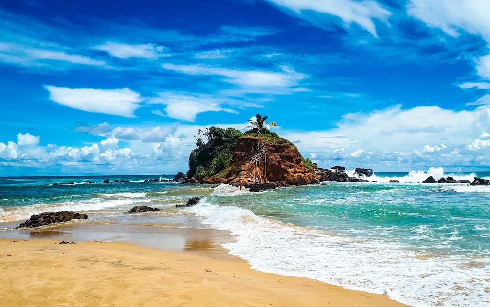 island under blue sky