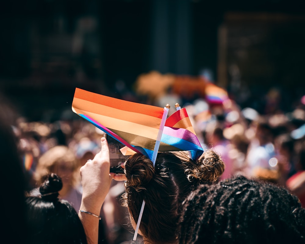 person holding flaglet