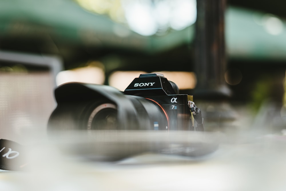 selective focus photo of Sony DSLR camera