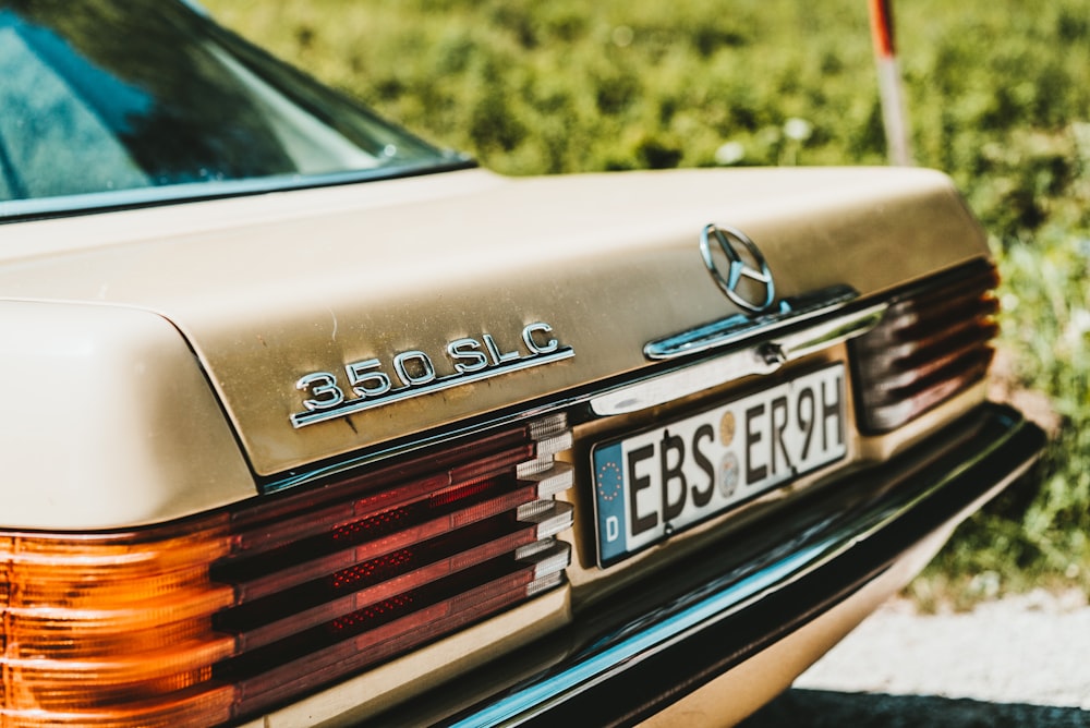 brown classic Mercedes-Benz 350 SL C car