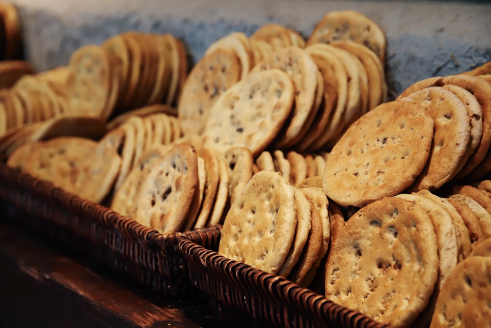 a basket full of cookies sitting on top of a table