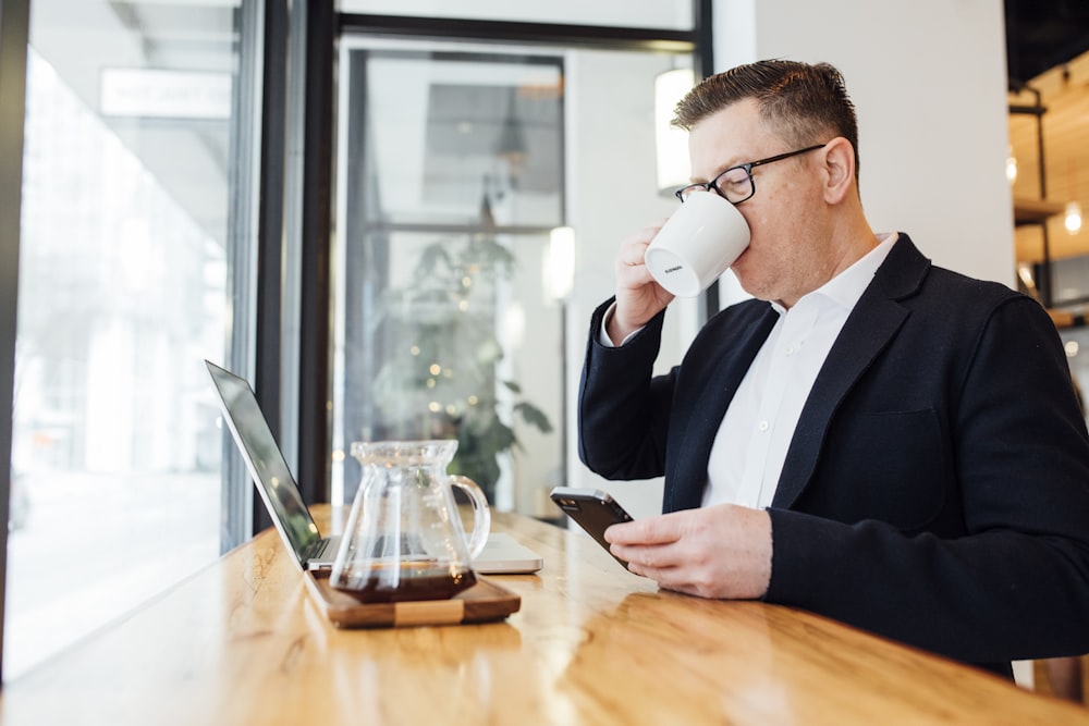 man sitting in front of table