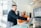 A satisfied client discussing IT solutions with a consultant.