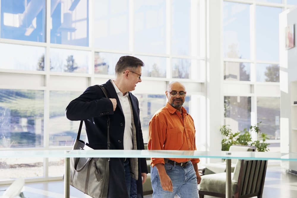 unknown persons standing indoors