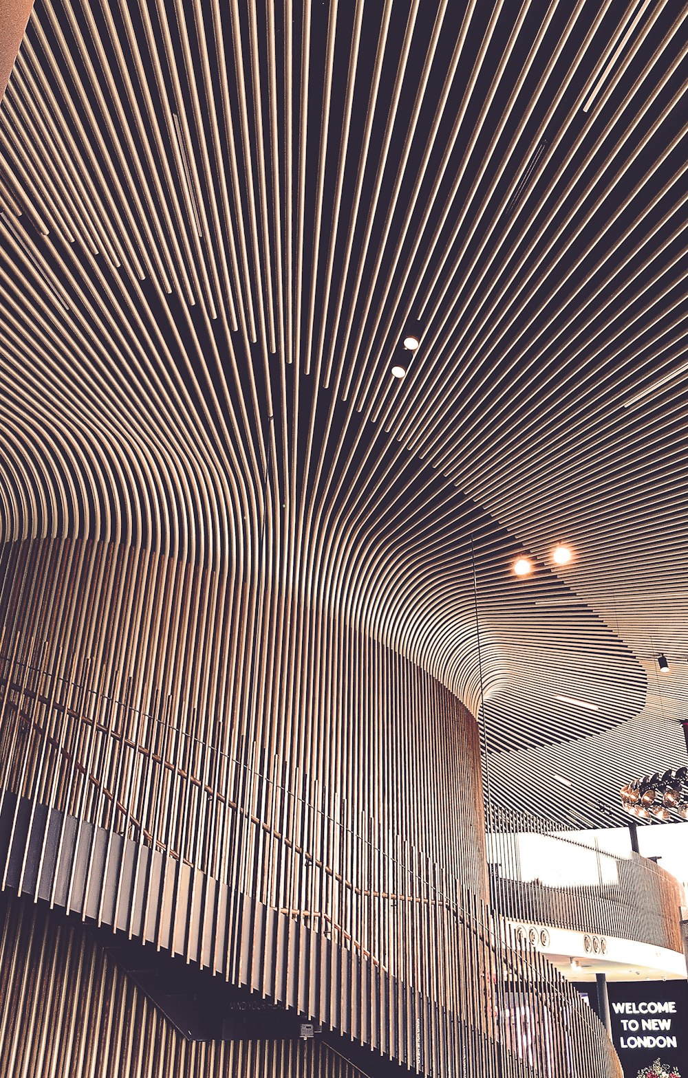 the ceiling of a building with a large pipe