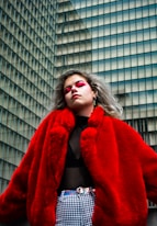 woman in red cardigan