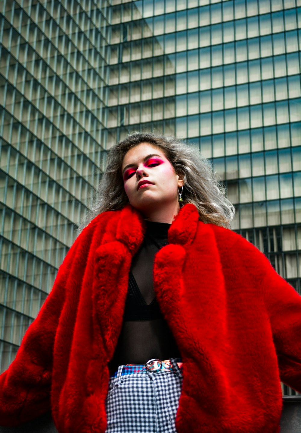 woman in red cardigan