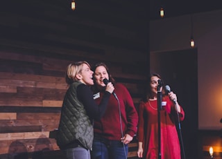 three women performing on stage