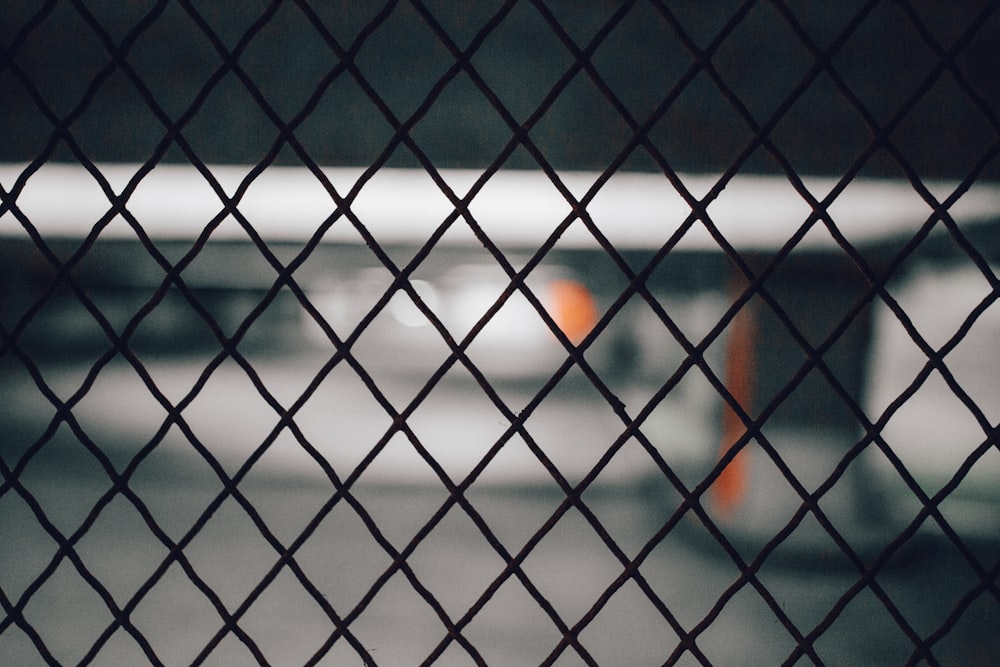 grey metal fence during daytime