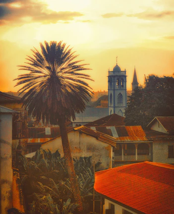 Sunset view of the iconic San Miguel Arcángel church with warm colonial hues.