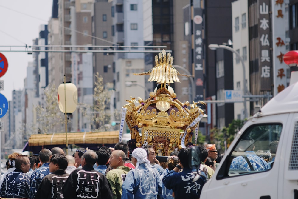 group of men at the carries gold rickshaw at the street