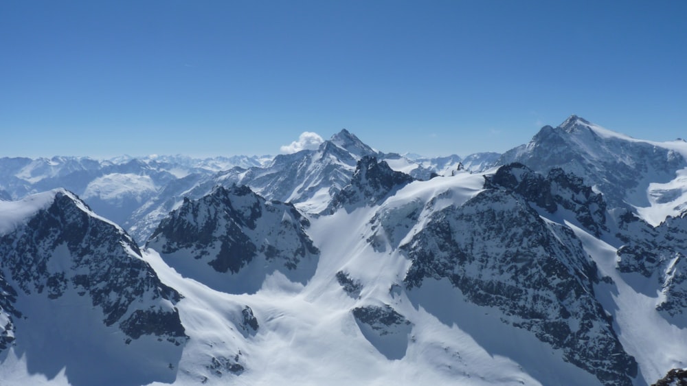 mountain covered with snow during daytime