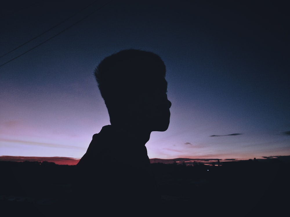 silhouette photography of man