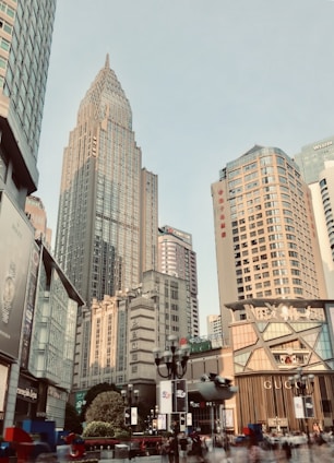 A bustling commercial building with shops and offices in a city center.